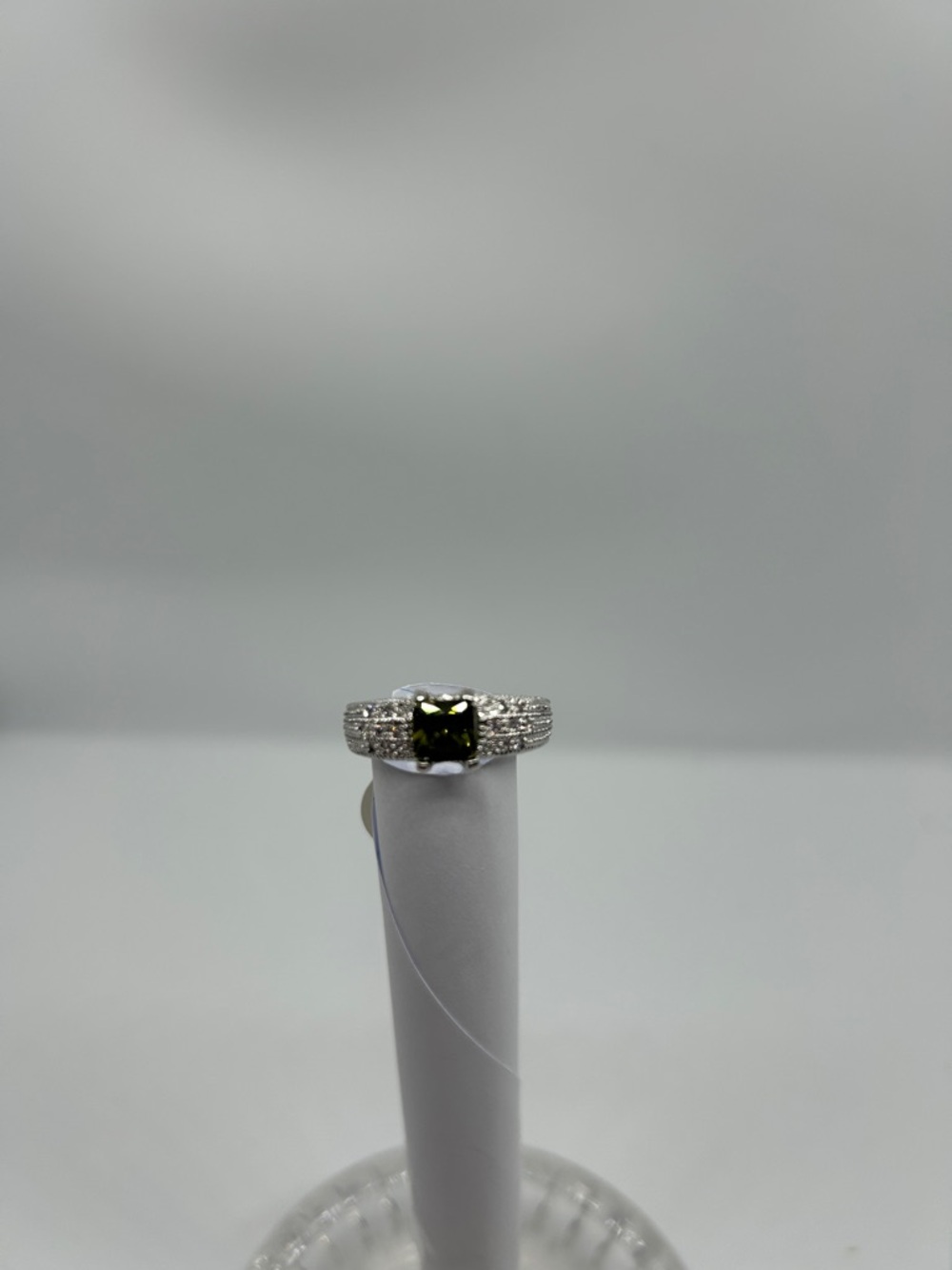 Ring with Olive Green Cushion Stone and Pavé Band